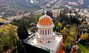 Who is the owner of the Baha’i gardens in Haifa